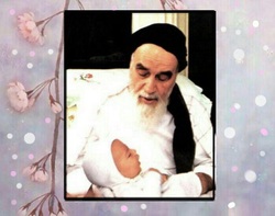 به پاکی نوزادی در آغوش امام