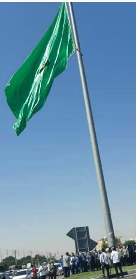 اهتزاز پرچم بارگاه منوّر حرم رضوی در اسلامشهر