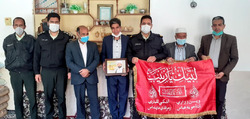 خادمان بنیاد حفظ آثار شهدای دستجرد در نوروز ۱۴۰۰ به دیدار خانواده شهدا رفتند