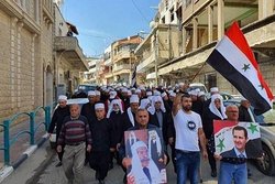 تجمع اهالی جولان اشغالی در حمایت از «بشار اسد»