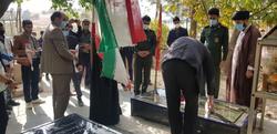 عطر افشانی قبور شهدای شهر مال خلیفه