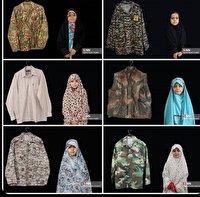 عکس یادگاری دختران شهدا با پیراهن پدر