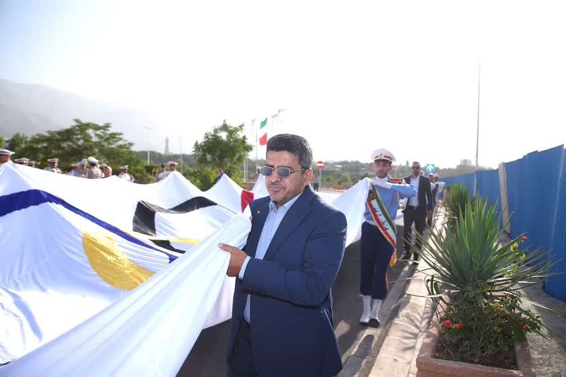 اهتزاز بزرگترین پرچم IOC در محل کمیته‌ملی المپیک ایران
