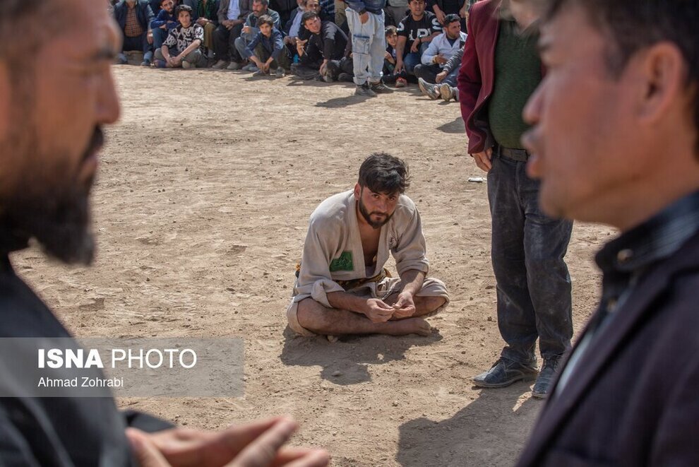 تصویر | مسابقات کشتی سنتی افغانستانی‌های مقیم ایران