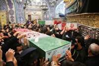 طواف پیکر‌های هفت شهید گمنام در حرم حضرت معصومه (س)