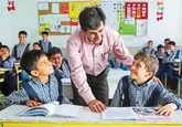 برنامه درسی جدید با عبور از کتاب درسی روی میز مدارس